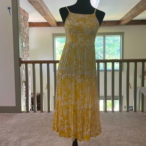 Yellow dress with white floral pattern